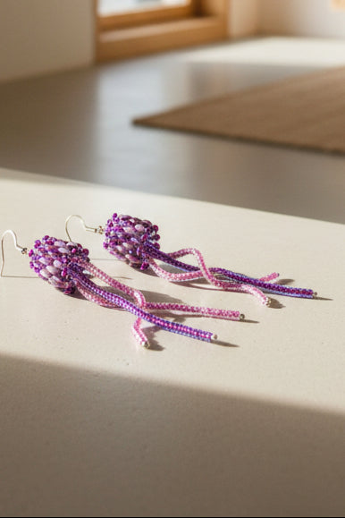 Light blue wired jellyfish earrings handmade with Miyuki beads and sterling silver hooks